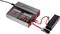 Chargeur avec affichage montrant les informations de charge. La batterie connectée est en cours de chargement. Marque 'Voltcraft'.