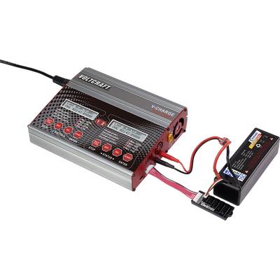 Un chargeur de la marque Voltcraft est connecté à une batterie lithium-polymère et affiche des informations de charge sur son écran.