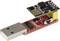 Un adaptateur USB vers ESP01 avec un module WiFi ESP8266. L'adaptateur est rouge et comprend plusieurs composants électroniques.