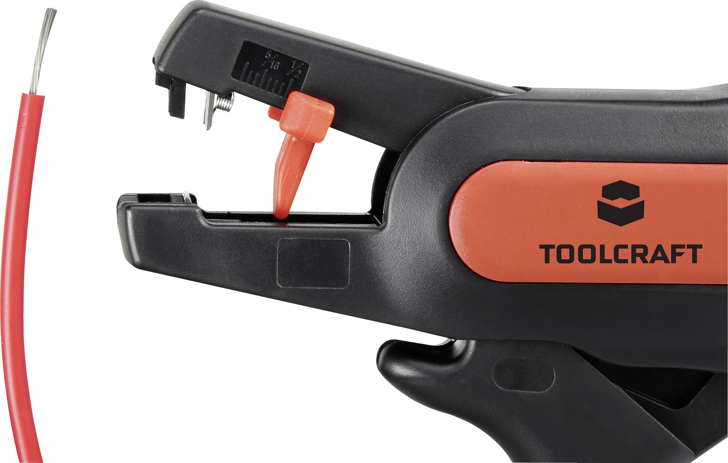 Pince à dénuder de marque Toolcraft avec poignée rouge, un câble dénudé visible à gauche. Instrument utilisé pour couper et dénuder les câbles.