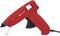 Pistolet à colle chaude rouge avec gâchette noire et câble, vue latérale. Adapté aux travaux de bricolage et de réparation.