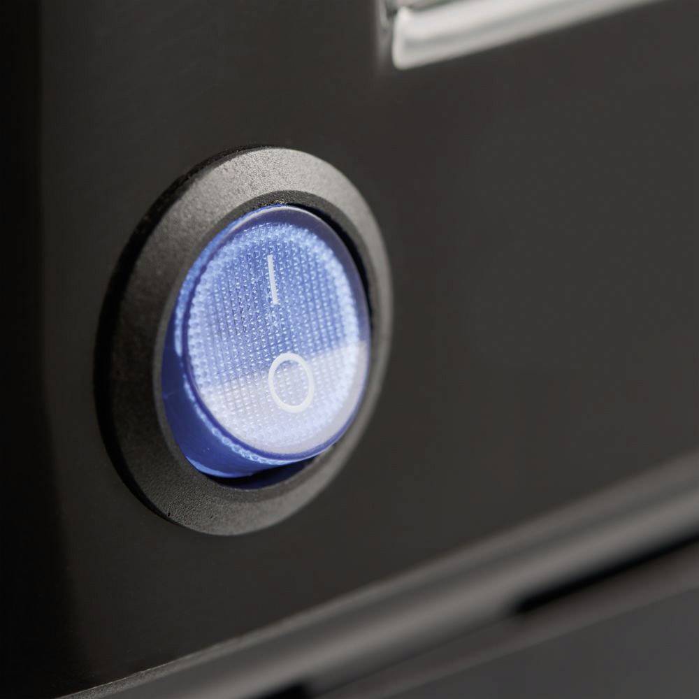 Un interrupteur bleu éclairé en position 'Marche' sur un appareil noir.