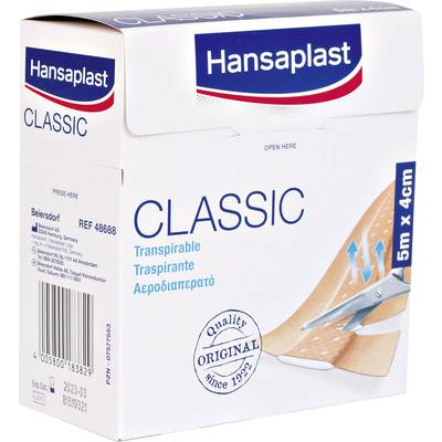 Une boîte blanche portant l'inscription 'Hansaplast Classic'. Elle représente des ciseaux coupant un pansement. Texte en plusieurs langues.