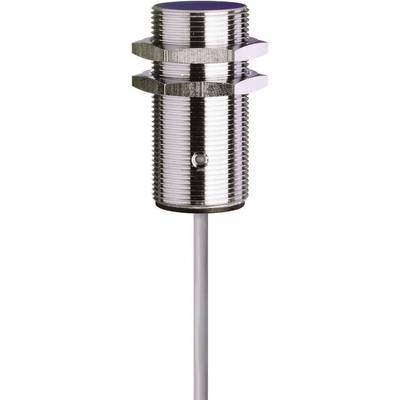 Capteur cylindrique métallique avec boîtier rainuré et connexion de câble à l'extrémité inférieure. Face supérieure et inférieure filetées.