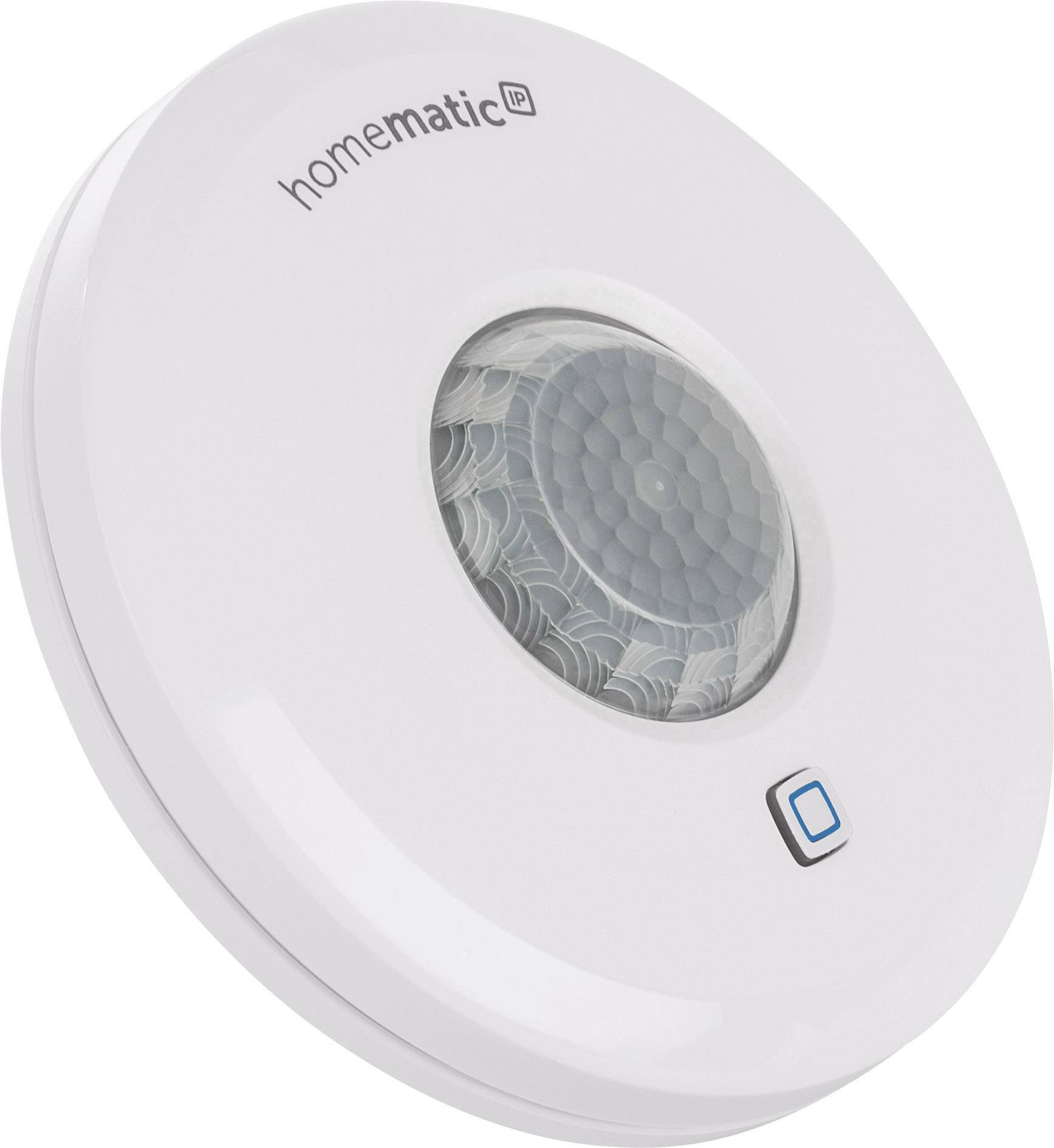 Un capteur de mouvement rond et blanc de 'Homematic IP' avec un bouton rectangulaire à l'avant.