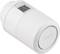 Thermostat blanc cylindrique avec un petit écran digital et le nom de la marque sur la façade, destiné au contrôle du chauffage.