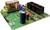 Module de circuit imprimé avec divers composants électroniques, comprenant des relais, des condensateurs et des connexions.