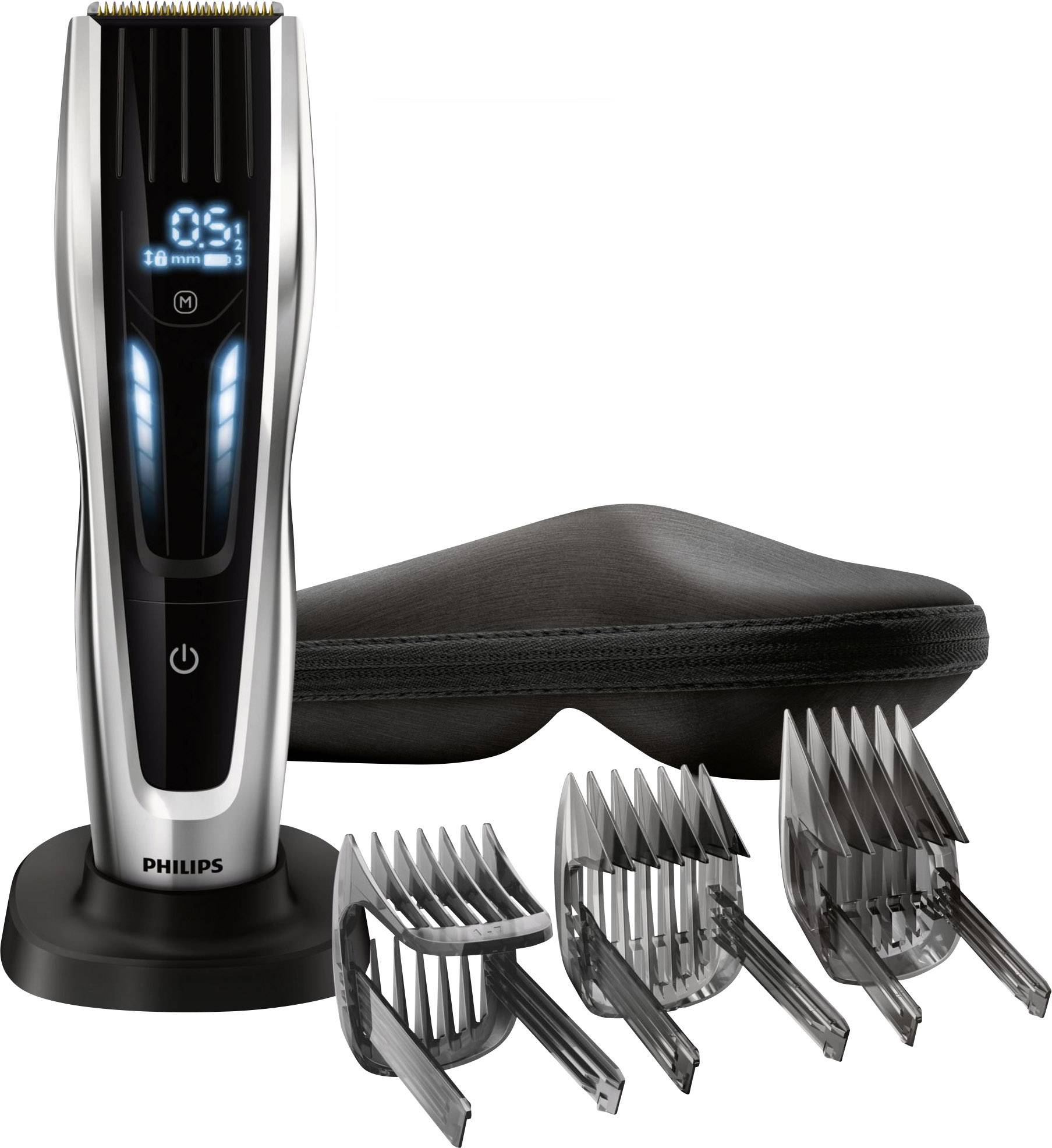 Tondeuse électrique Philips avec affichage LED, éclairage bleu, plusieurs accessoires de coupe et étui noir.