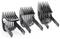 Trois peignes de coupe à cheveux noirs de différentes tailles sont disposés côte à côte. Idéaux pour des coupes de cheveux précises.