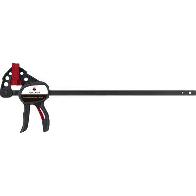 Pince-étau à vis de serrage avec poignée rouge et longue tige noire. Marque 'Toolcraft' apposée sur un ovale noir.