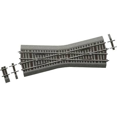 Aiguillage d'un rail de modélisme ferroviaire qui se divise en deux directions. Adapté pour des reproductions à l'échelle de lignes de chemin de fer.