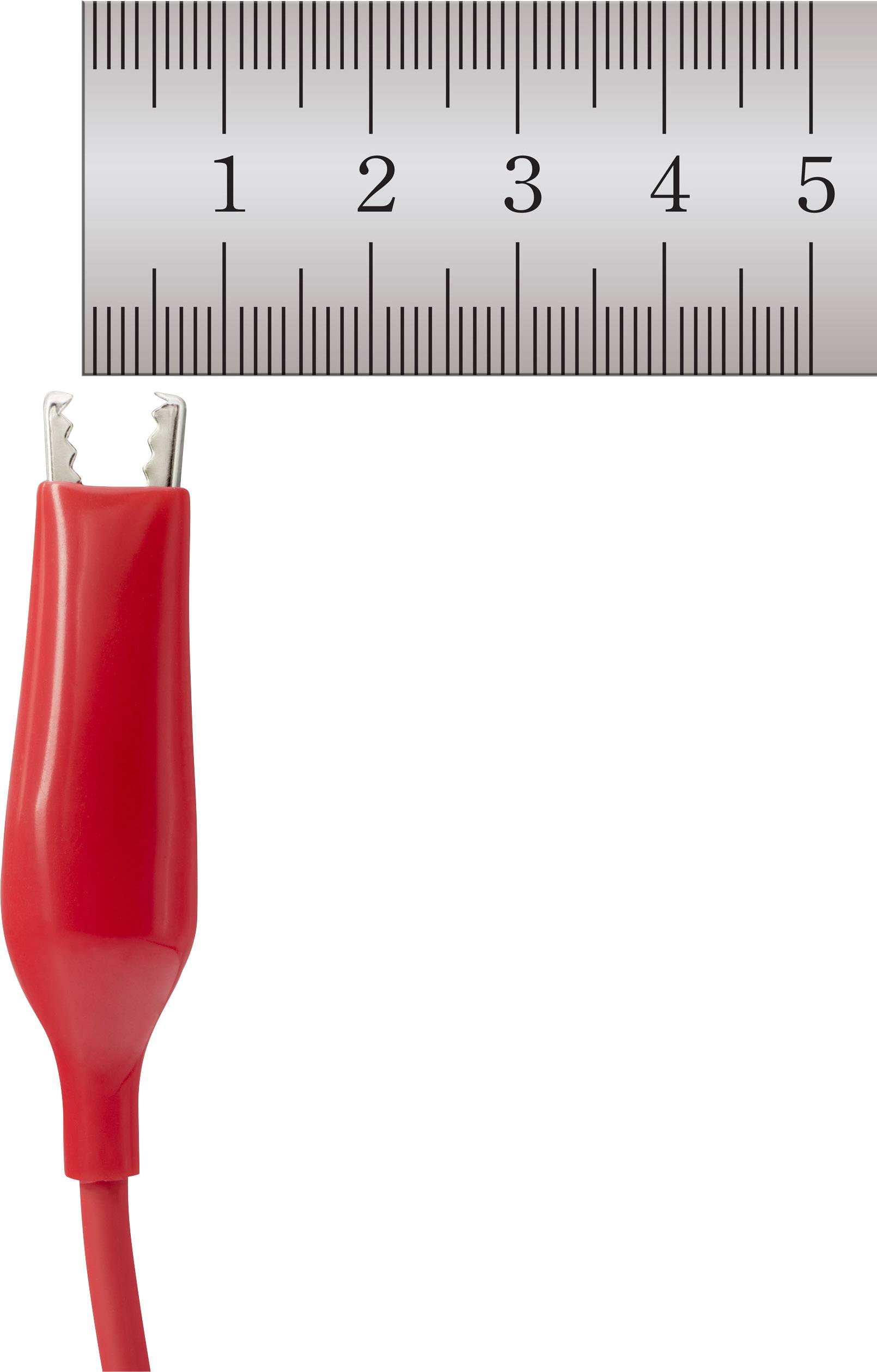 Câble crocodile rouge et règle métallique, montrant une mesure d'environ 4,5 cm.