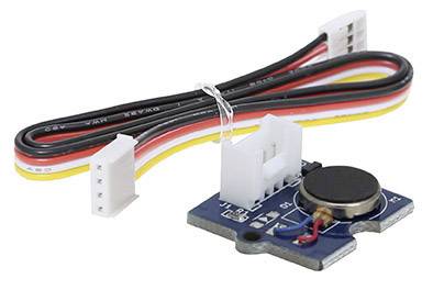 Un moteur vibrant avec câble. Le moteur est monté sur une carte de circuit imprimé bleue, à laquelle est connecté un câble en nappe multicolore.