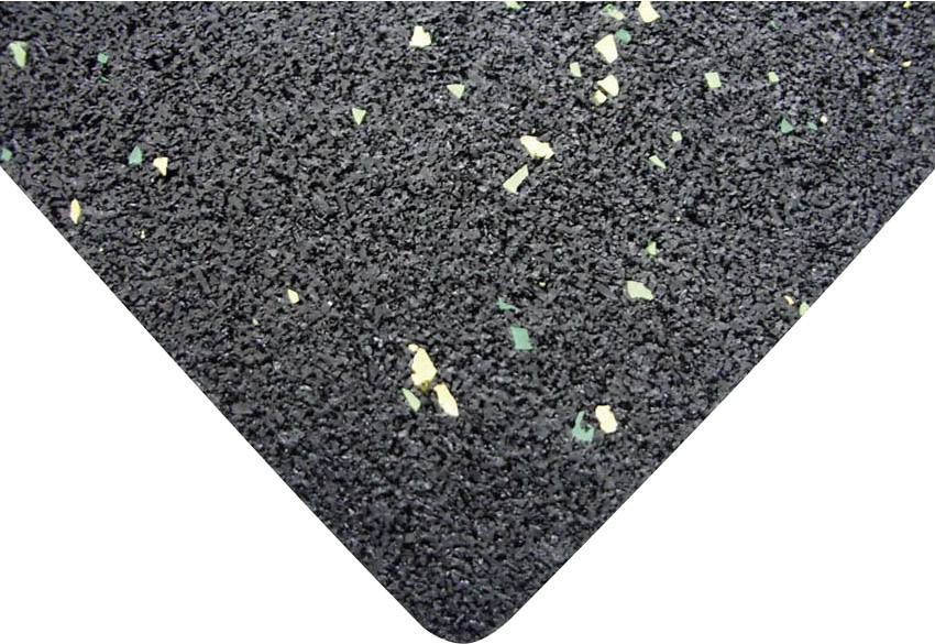 Gros plan d'un matériau en mousse noir parsemé de particules jaunes et vertes.
