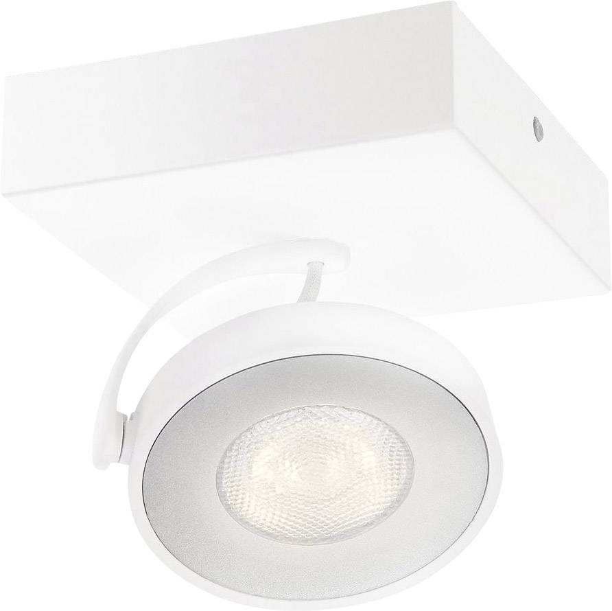 Un plafonnier blanc avec un spot circulaire orientable. Le socle carré est fixé au plafond.