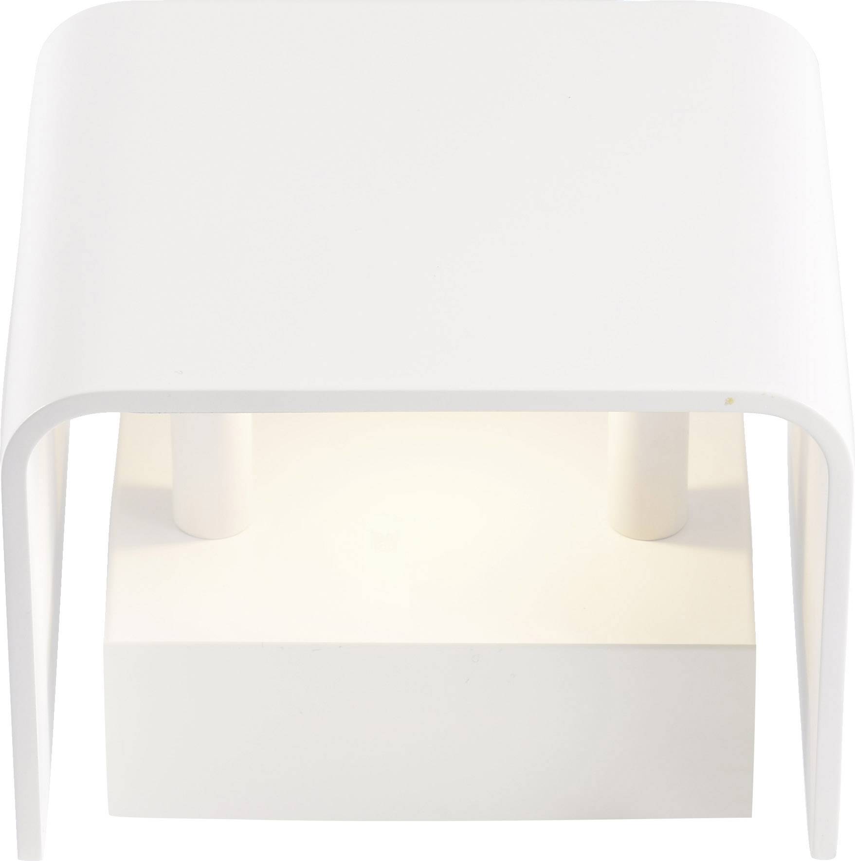 Lampe de table moderne blanche avec un abat-jour incurvé et un socle rectangulaire. La lampe diffuse une lumière douce et diffuse.