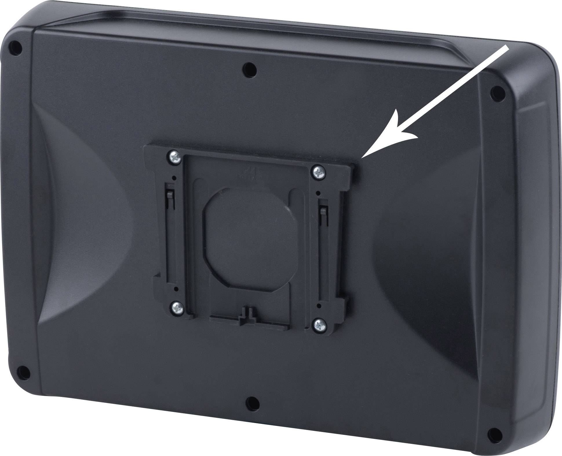 Arrière d'un appareil noir avec support, indiqué par une flèche blanche.