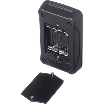 Un compartiment à piles noir avec un couvercle ouvert, quatre emplacements de piles vides et des contacts visibles.