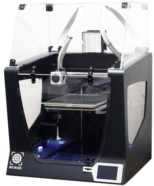 Imprimante 3D avec boîtier transparent, montrant le plateau d'impression et l'extrudeur. Adaptée pour une utilisation dans des environnements industriels ou professionnels.