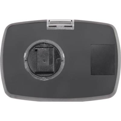 Un boîtier rectangulaire en plastique sombre avec une partie ronde et saillante en son centre et une petite zone carrée sur la droite.