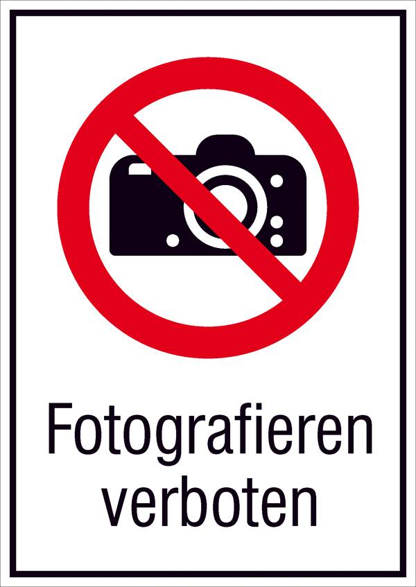 Un panneau d'interdiction avec un appareil photo barré et le texte « Photographie interdite »