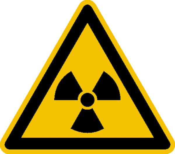 Panneau d'avertissement à fond jaune avec un symbole noir de rayonnement, avertissant du danger de radiation radioactive.