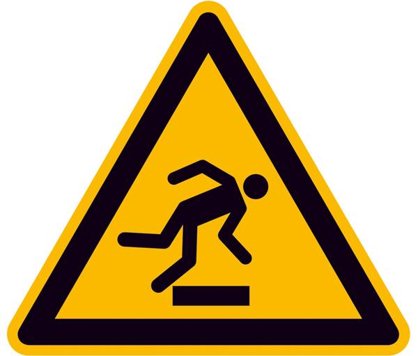 Panneau d'avertissement avec le symbole d'une personne qui trébuche. Le panneau avertit du danger de trébuchement sur un sol irrégulier.
