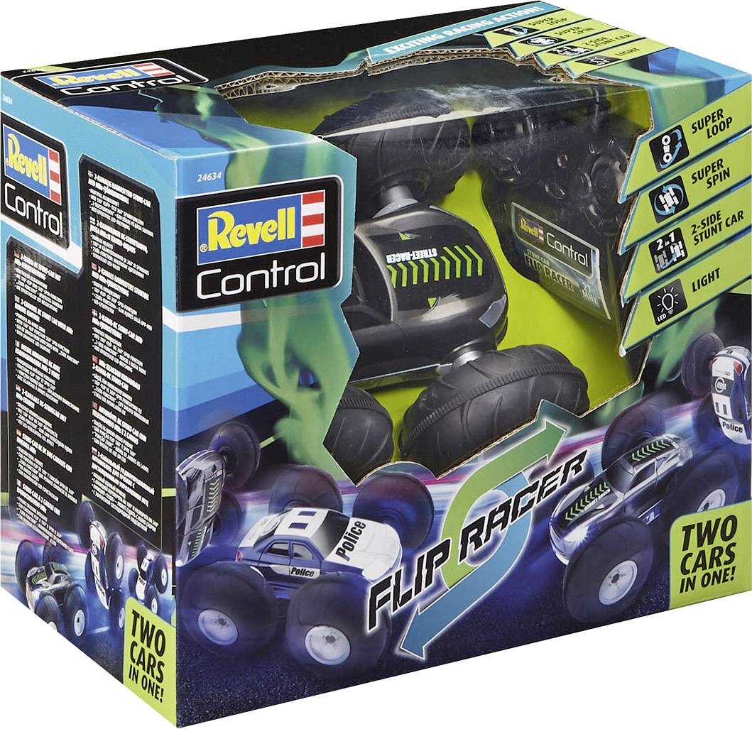 Emballage de voiture jouet portant l'inscription 'Flip Racer'. Contient une voiture noir et vert avec de grandes roues, adaptée pour des cascades.