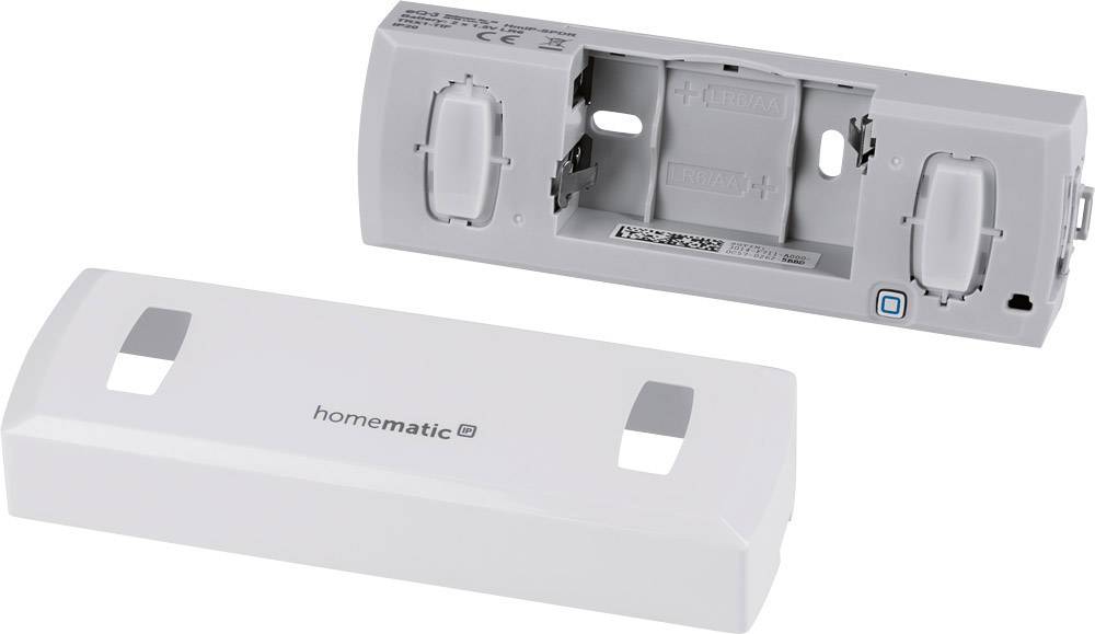 Un appareil Homematic IP ouvert, avec des zones de montage et de raccordement visibles, ainsi qu'un boîtier de couverture retiré.