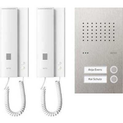 Deux interphones blancs avec combinés à côté d'un système d'appel argenté. Sur les plaques nominatives, on peut lire les noms 'Anja Evens' et 'Kai Schulz'.