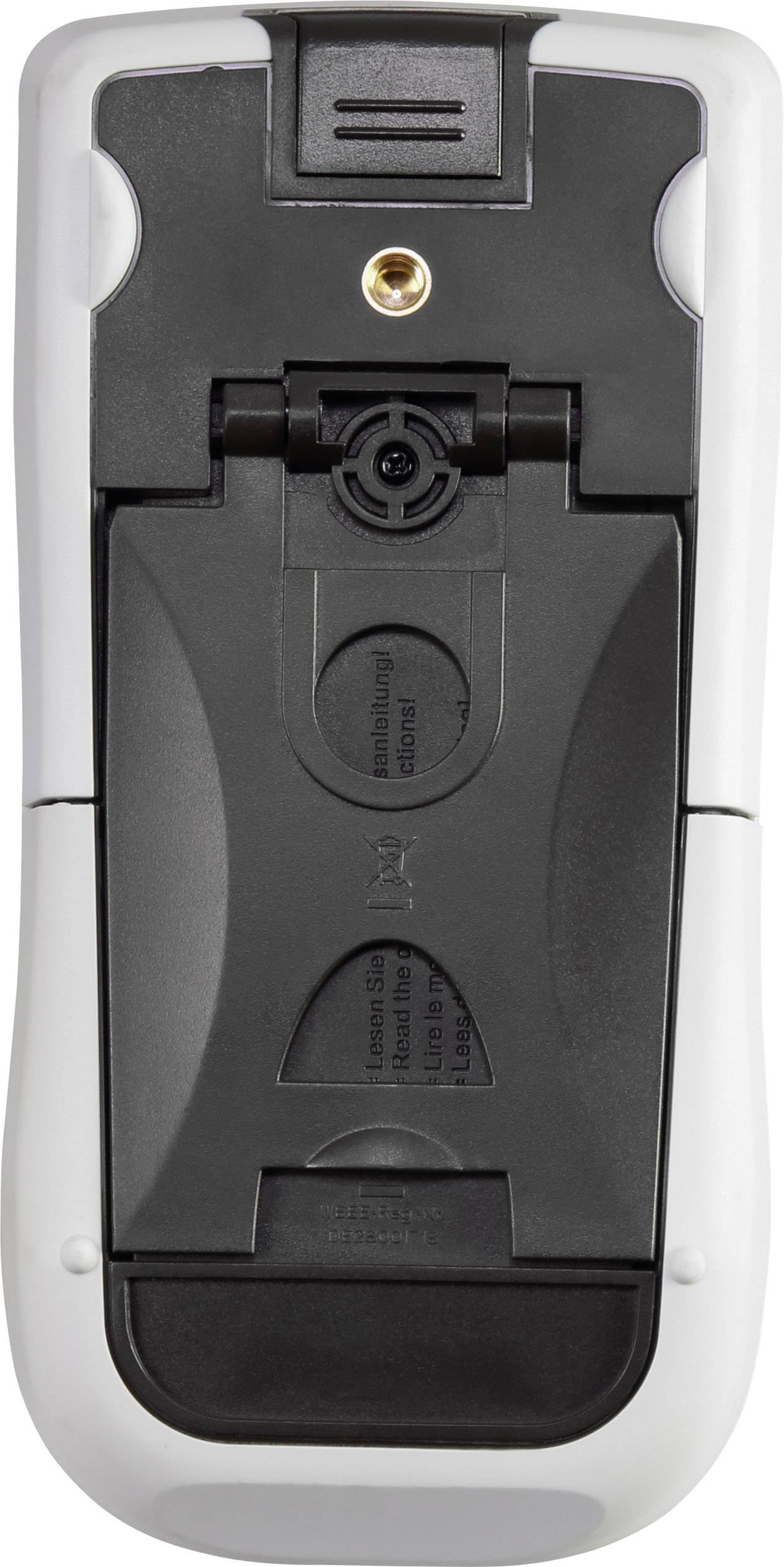 Le dos d'une télécommande avec un compartiment à piles et un connecteur pour une antenne ou un autre appareil.