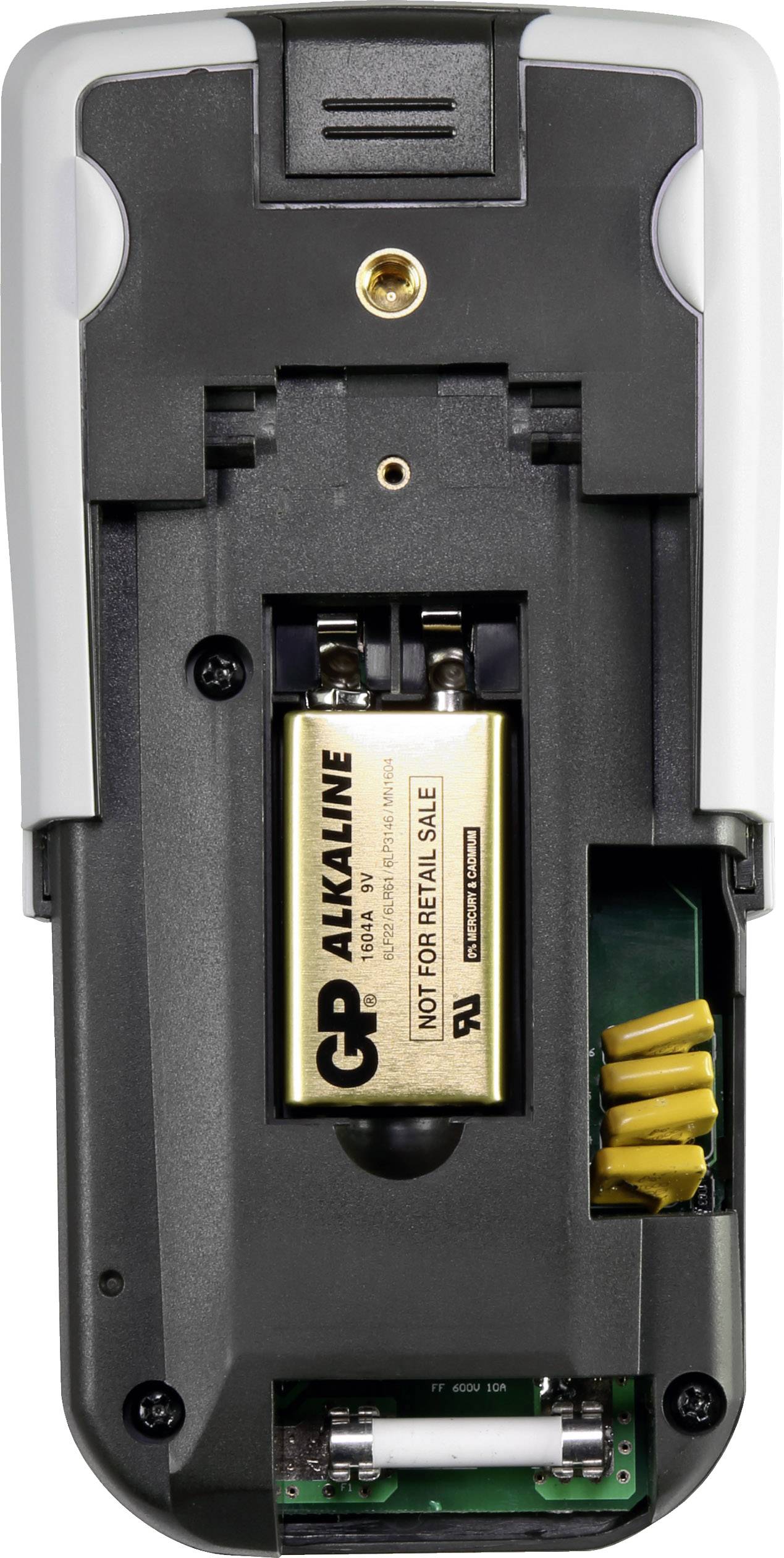 Vue arrière d'un appareil avec le compartiment à piles ouvert, montrant une pile alcaline de 9 volts insérée et les connecteurs situés en dessous.