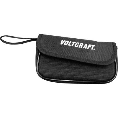 Un sac noir portant l'inscription 'VOLTCRAFT'. Il possède une bandoulière en haut à gauche et un rabat qui couvre l'ouverture.
