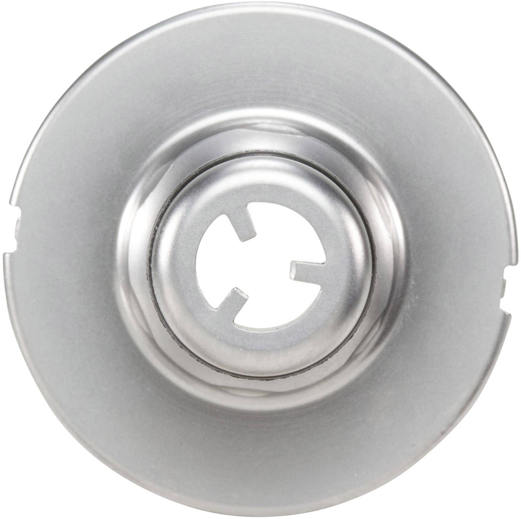 Une lame de coupe en métal argenté avec un design rond centré et des bords dentelés, souvent utilisée pour des travaux créatifs.