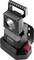 Lampe de travail portable noire avec poignée et interrupteur rouge, adaptée aux zones à risque d'explosion, conforme à la certification ATEX.