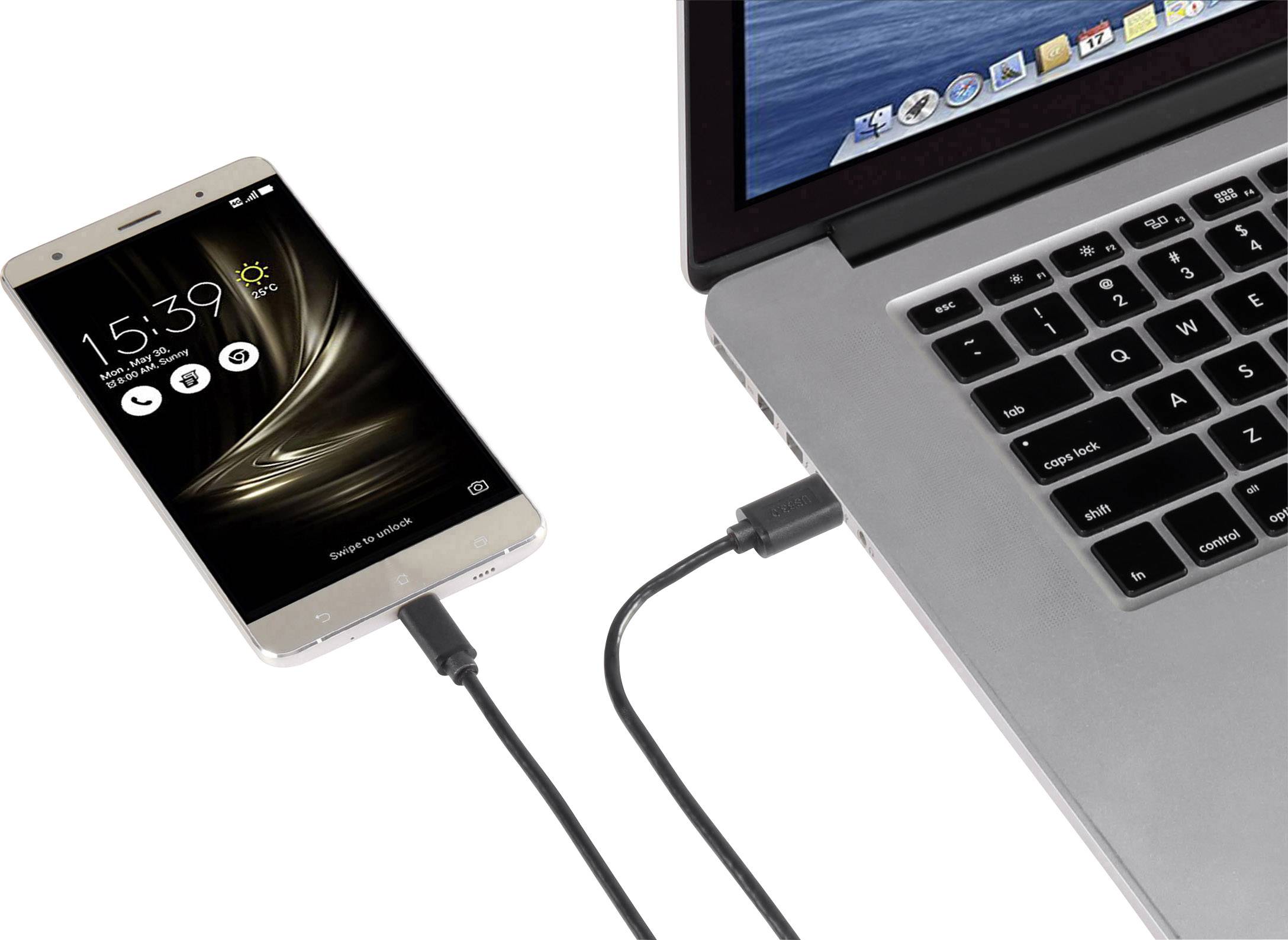 Smartphone connecté à un ordinateur portable via un câble USB ; l'écran affiche l'heure 15:39 ; utilisé pour le transfert de données ou la charge.