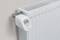 Un radiateur blanc avec un thermostat numérique affichant une température de 21,0 degrés Celsius.