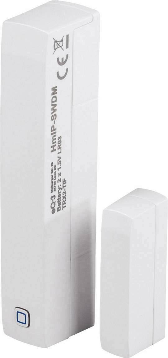 Un contact magnétique de porte et de fenêtre au design rectangulaire, utilisé dans les systèmes de sécurité pour détecter les ouvertures.