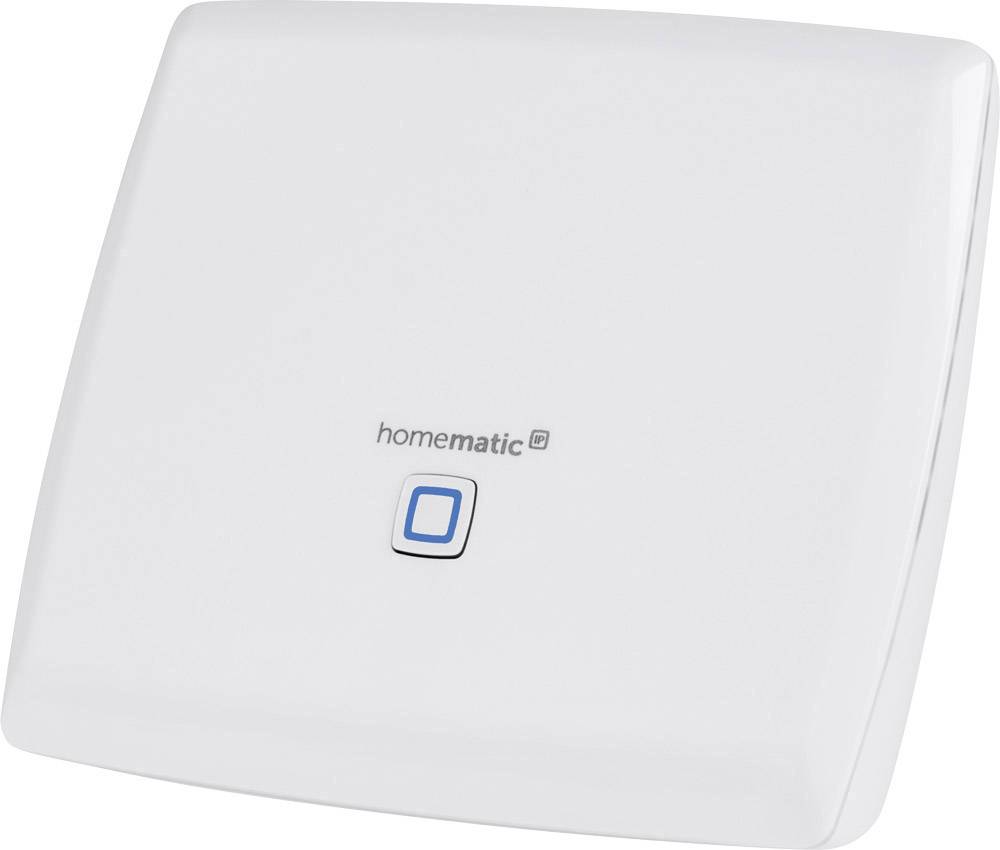 Dispositif Homematic carré blanc avec un bouton bleu central. Utilisé pour contrôler des fonctions domotiques.
