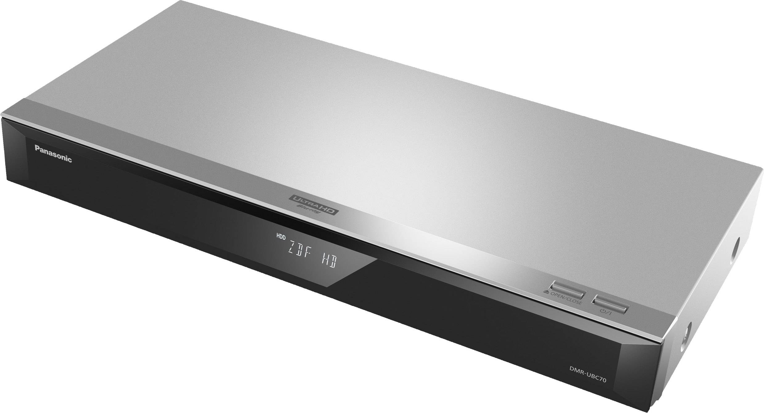Un lecteur Blu-ray élégant, argenté, avec un affichage numérique sur la façade. Forme rectangulaire, boutons minimalistes en haut à droite. Adapté pour les configurations home-cinéma.