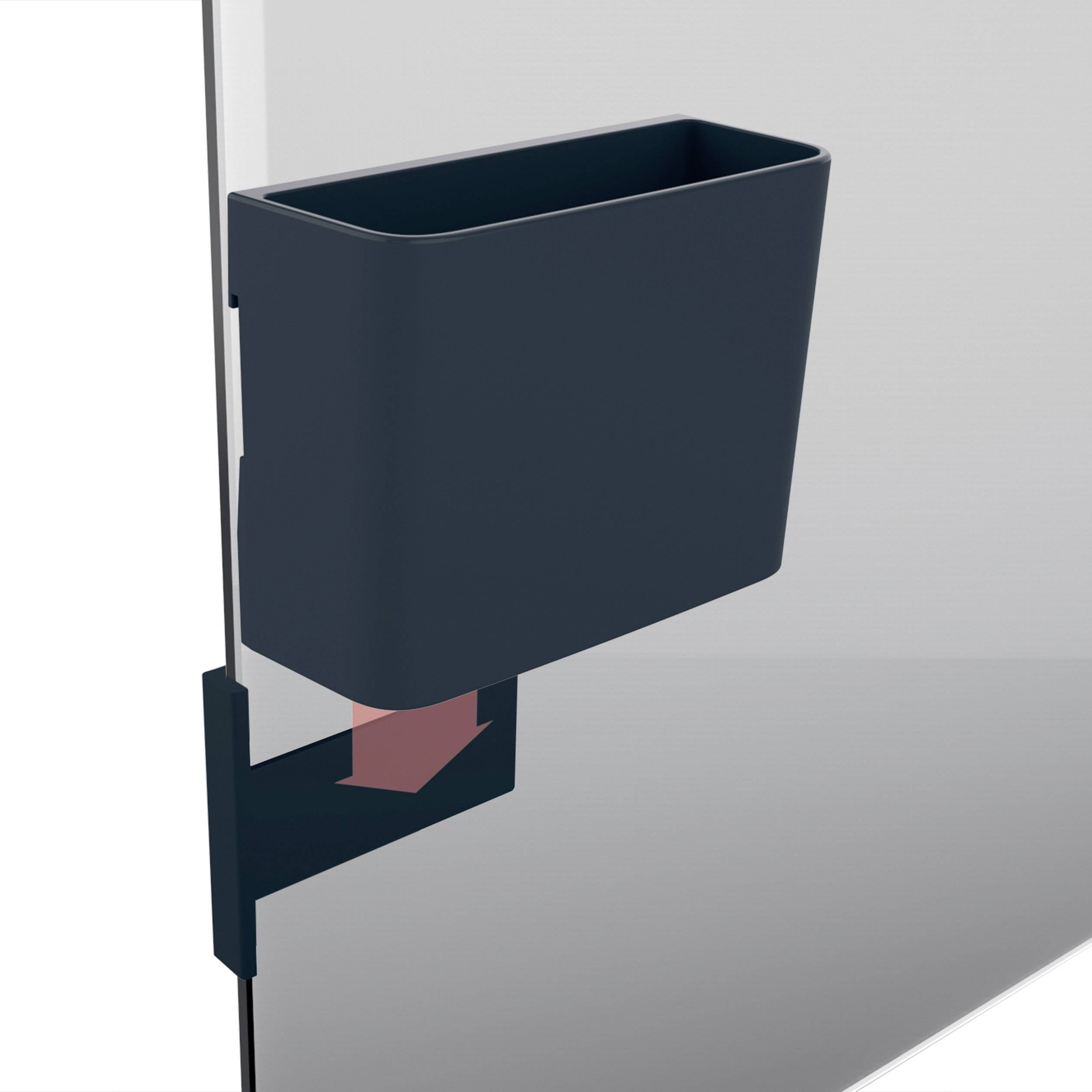 Un conteneur noir est monté latéralement sur une paroi transparente. Le conteneur a une forme rectangulaire et est ouvert en haut.