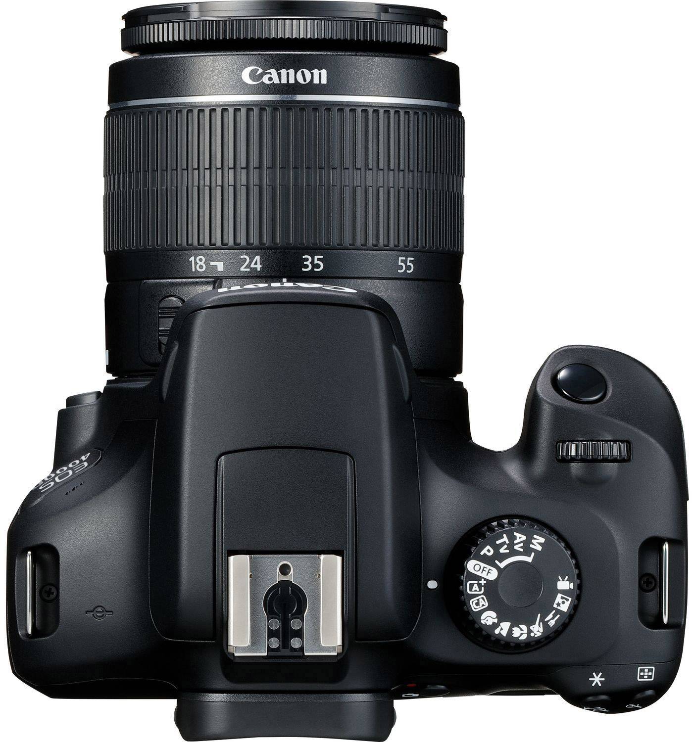 Appareil photo reflex numérique vu de dessus avec molette de sélection des modes rotative et objectif zoom ; adapté aux passionnés de photographie.