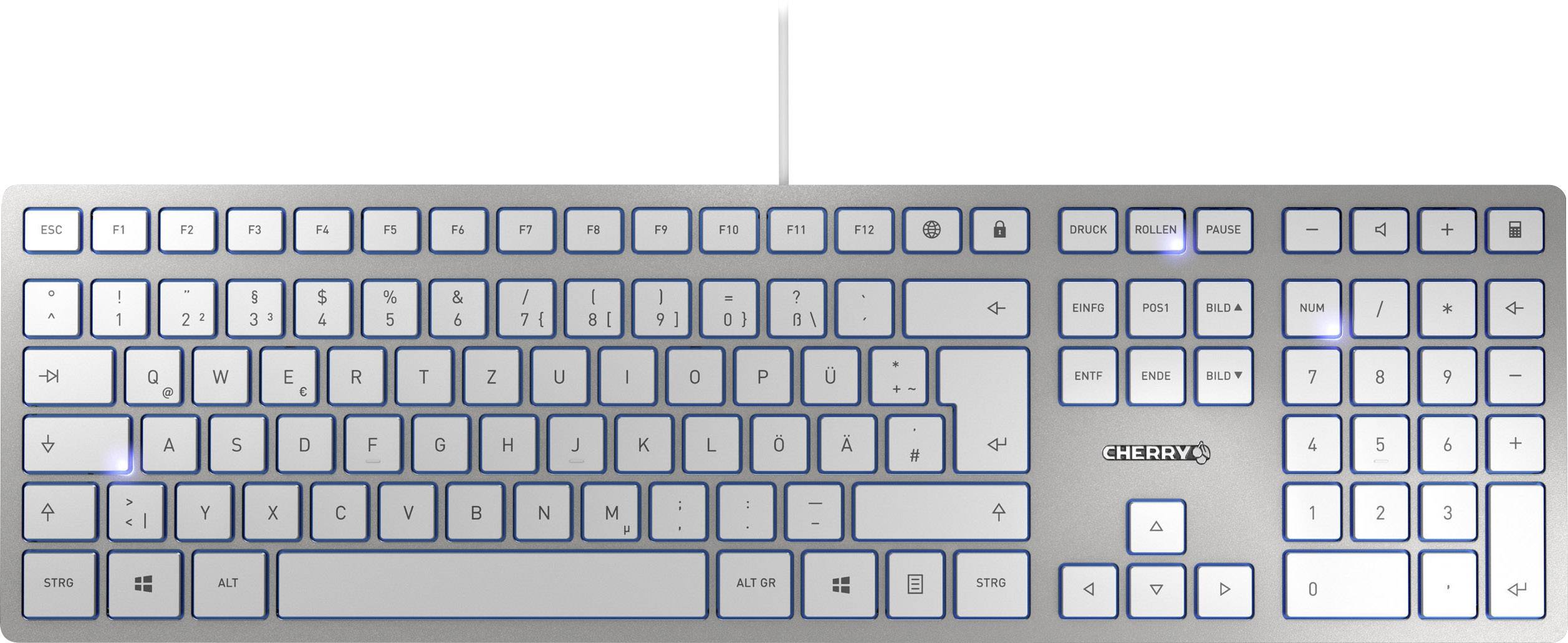 Clavier d'ordinateur argenté avec connexion filaire et rétroéclairage blanc. Disposition des touches QWERTZ allemande avec touches de fonction en haut.