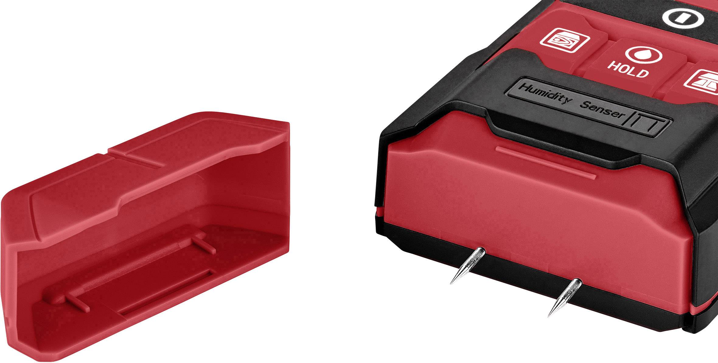 Un appareil de mesure d'humidité rouge et noir avec son couvercle de protection retiré. Deux broches métalliques de mesure sont visibles.