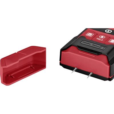Un appareil de mesure d'humidité rouge et noir avec son couvercle de protection retiré. Deux broches métalliques de mesure sont visibles.