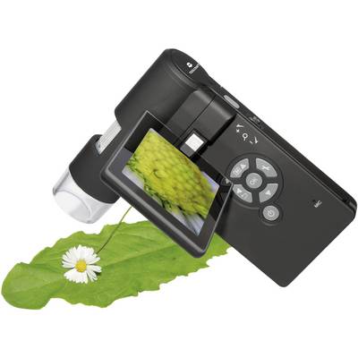 Appareil photo numérique posé sur une feuille verte ; l'écran affiche un gros plan d'une fleur jaune.