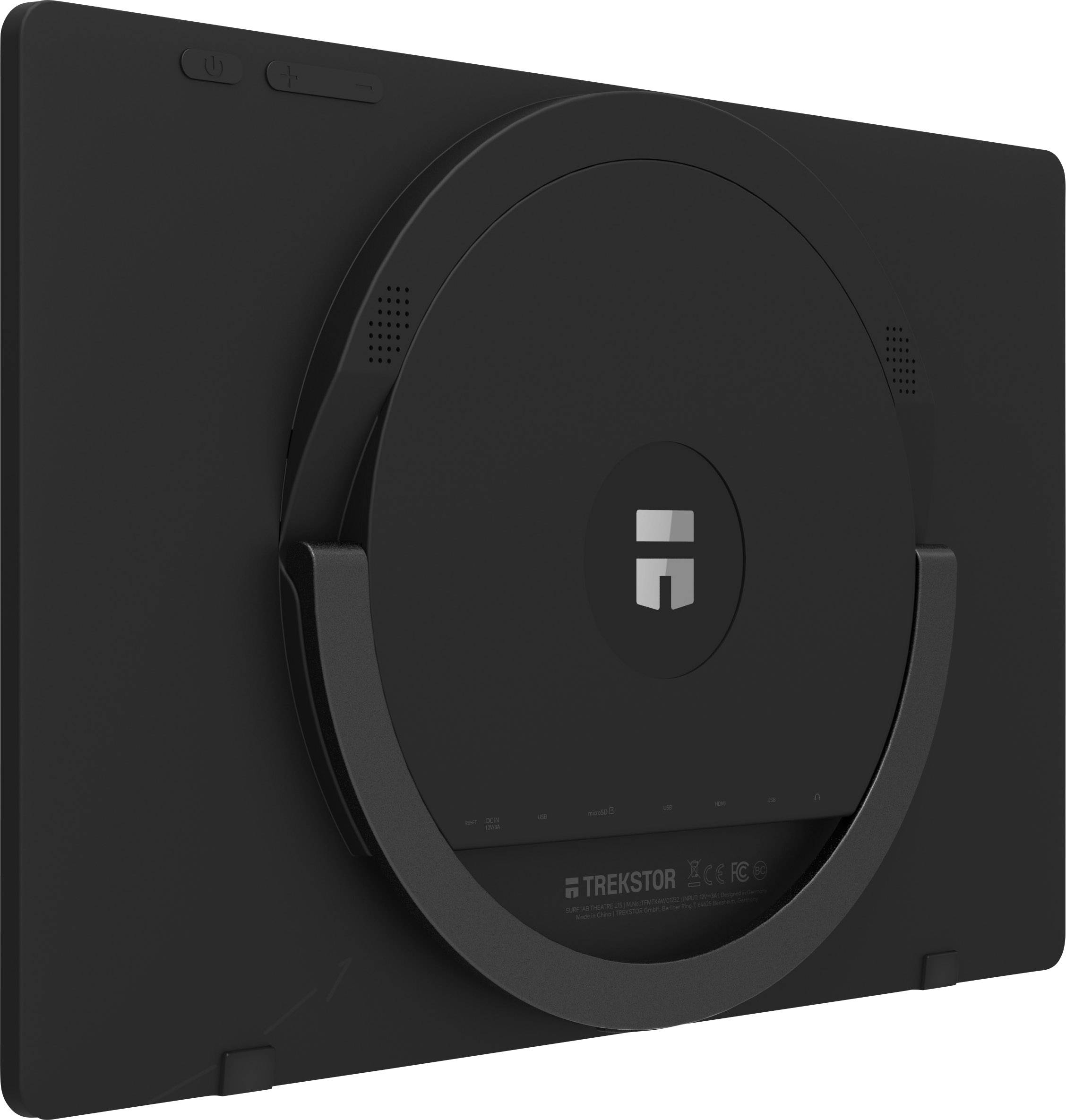 Dos d'une tablette noire avec un support circulaire et des grilles de haut-parleurs ; le logo de la marque au centre du support.