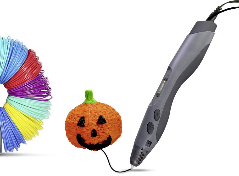 Stylo 3D avec modèle de citrouille. À gauche, des bobines de plastique colorées.