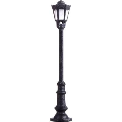 Un lampadaire décoratif noir avec une tête de lanterne au design classique et une base ronde.