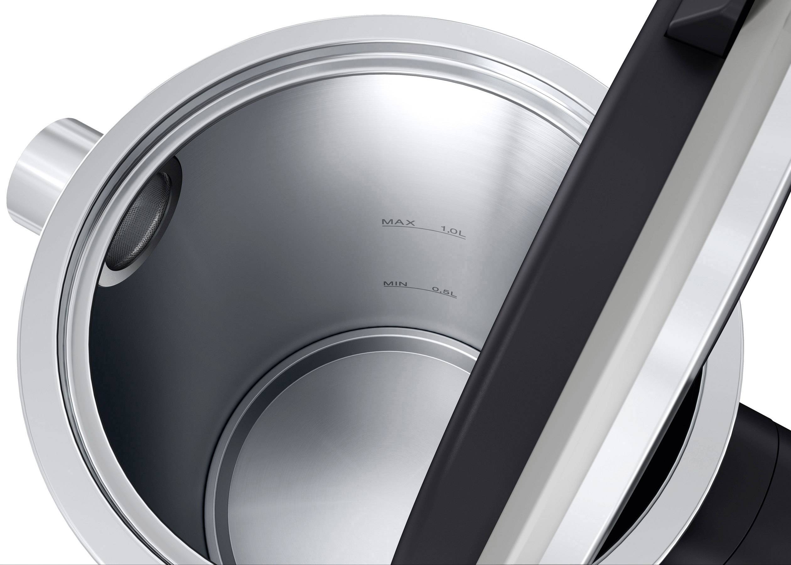 Un bouilloire électrique en acier inoxydable, vue de dessus, avec le couvercle ouvert. À l'intérieur, on peut voir les marquages de niveau de remplissage minimal et maximal.